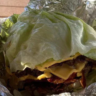 Triple bacon cheeseburger wrapped in lettuce, awesome!