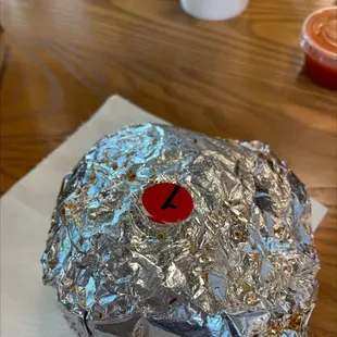 a donut covered in tin foil