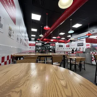 a restaurant with tables and chairs