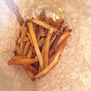 Bag full of little Cajun fries!