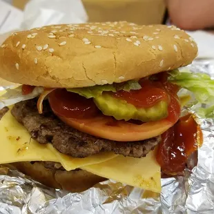 Chhhheeeeeessse buuuuhgah! With grilled onions, tomatoes, pickles, lettuce, mustard and ketchup.... yum!