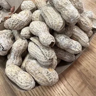 a pile of peanuts on a table