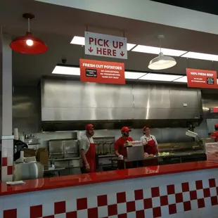 a fast food restaurant with a checkered counter
