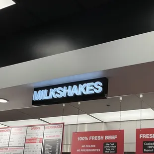 a sign that says milkshakes