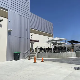 Located in industrial area. Look for the tables and umbrellas