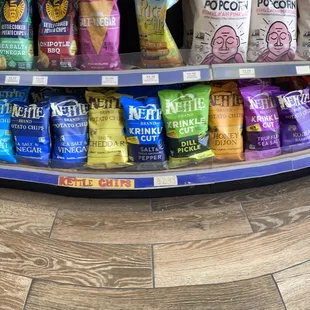 a variety of snacks on a shelf