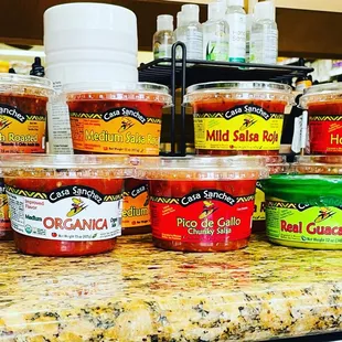 a variety of sauces on a counter