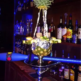 Pretty pineapple head hookah with ice tip! A must! Come try it! Ask for a decorated pineapple head!