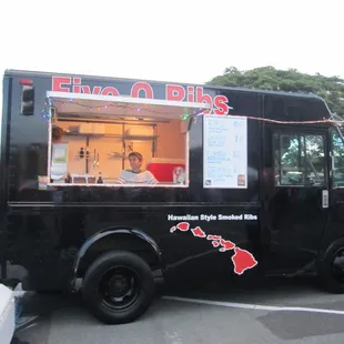 a food truck parked in a parking lot