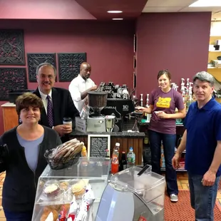 a group of people in a coffee shop