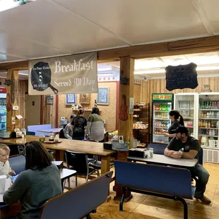 a group of people sitting at tables