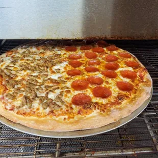 a pepperoni pizza in the oven