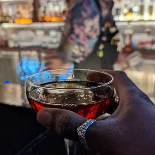 A drink in the hand...