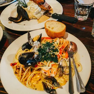 The Seafood Linguini was the best! The French Cut Pork Chop (in back) was also good.