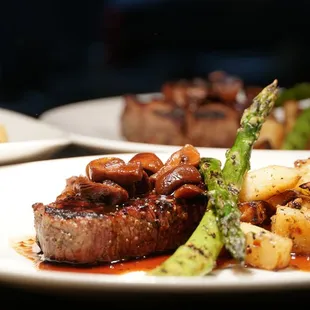 6 oz. Filetto Angus Filet smothered in brandied crimini mushrooms, shallot demi-glace, truffle oil mashed potatoes, grilled asparagus.