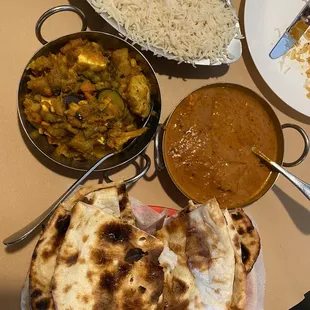 Fish curry and vegetable. Basmati comes with curry and ordered plain naan and roti on side.