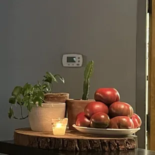 a bowl of apples on a table