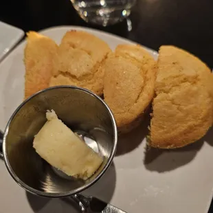 a plate of biscuits and butter