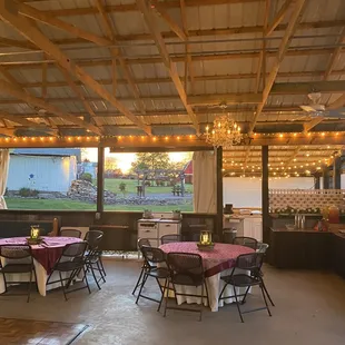 tables and chairs set up for a party