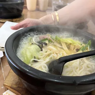 Fish in a mildly spice broth with still crisp lettuce and ham.