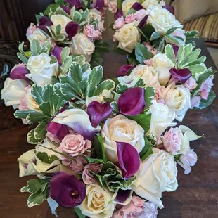 Bride and Bridesmaids Bouquets in red, white and pink