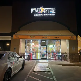 a car parked in front of the restaurant