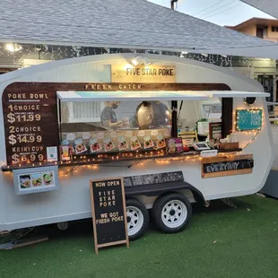 a food truck with lights on it