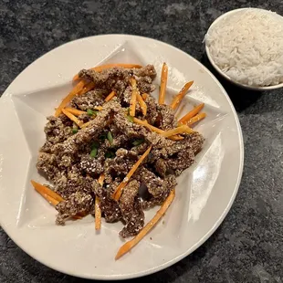 Crispy Sesame Beef with white rice.