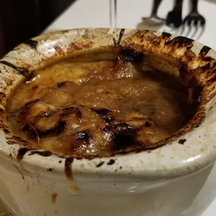 Burned Onion soup tasted like charcoal.
