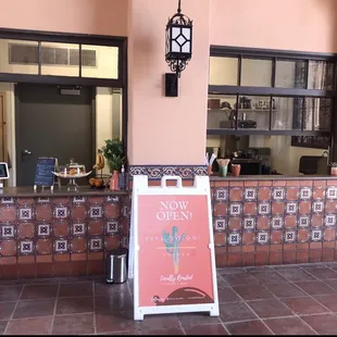 Outside &amp; front of where you order