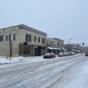 a snowy street in a small town