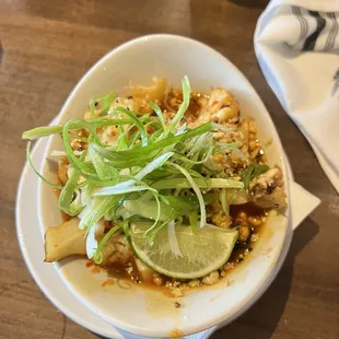 a bowl of food on a table