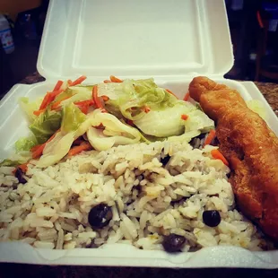 a meal in a styrofoam container