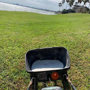 a wheelbarrower in the grass