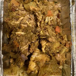 chicken and vegetables in a foil pan
