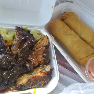 Jerk chicken, cabbage, rice and beans, eggrolls