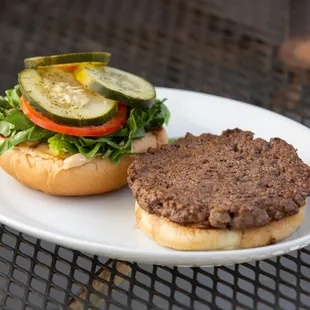 a hamburger and pickles