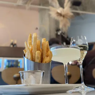 french fries and a glass of wine