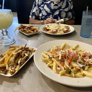 Cajun pasta, garlic cheese fries, pierogies, animal fries, pina colada