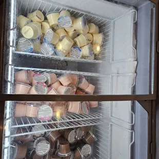 Ice cream cups in the freezer by the drinks area.  Hot tea available with soft drinks