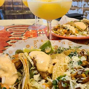 Three tacos and a margarita