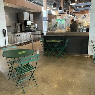 tables and chairs in a restaurant