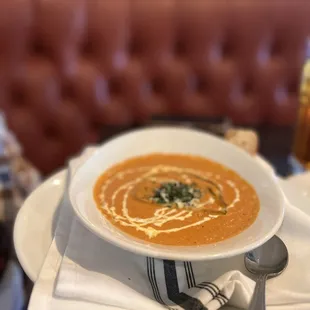 a bowl of soup on a plate