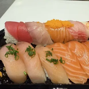 Rainbow, yellowtail nigiri, salmon nigiri (incredibly glossy)