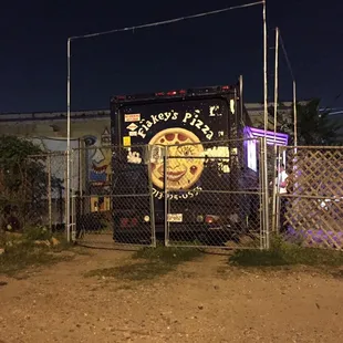 Side view of the pizza truck... Sketchy but tasty pizza.