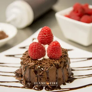 Brigadeirão, our Traditional Brazilian flourless rich dark chocolate cake enrobed in chocolate sprinkles