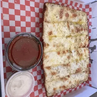 Cheese breadsticks (Detroit style pizza with cheese and garlic sauce)
