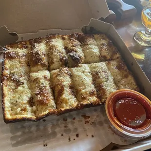 The amazing cheesy breadsticks inside of the box! So yummy!!!