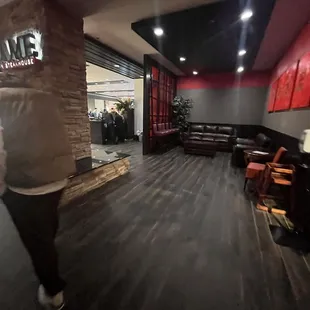 a man walking through the restaurant