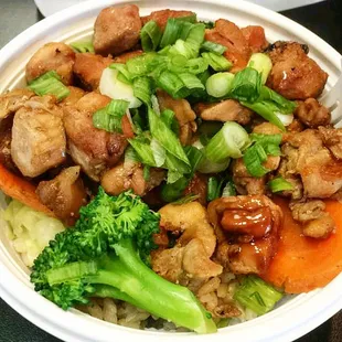 Chicken, veggies, and brown rice. Mini is the perfect size! Very filling